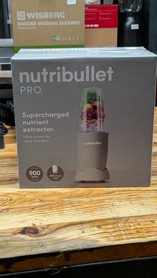 a box of nutribullet on a wooden table