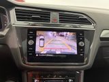 the interior of a car with a dash camera on the dashboard