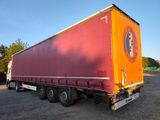 a large semi truck that is parked in a parking lot