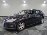 a picture of a black car parked on a checkered floor