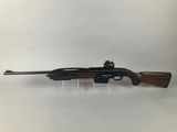 a rifle on a white background