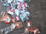 a pile of assorted items on a wooden floor