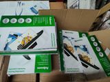 two boxes of electronic devices sitting on top of a cardboard box