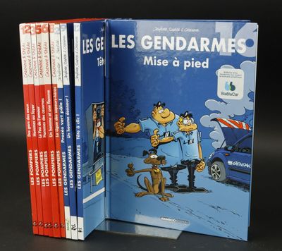 three books on a black surface with a cartoon dog and a cat