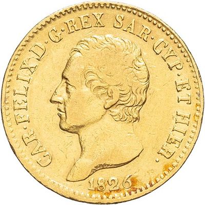 a close up of a gold coin on a white background