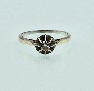 an image of a ring with a black diamond on it