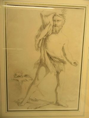 framed drawing of a man with a dog in a room