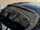 an open trunk of a car with luggage in it