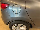 a close up of a car ' s tire with a hole in it