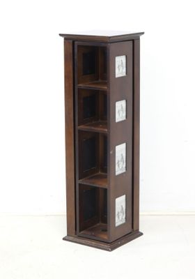 an image of a tall wooden bookcase with glass doors