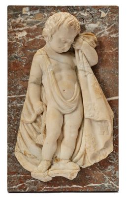 statue of a boy holding a bag on a marble block