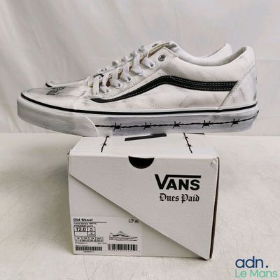 vans old skooler sneakers in a box on a white background