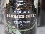 a close up of a bottle of wine on a table