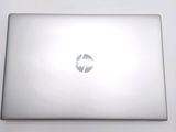 a laptop that is sitting on a white table