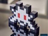 a black and white cat made out of lego blocks