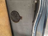 a car door with a hole in the middle of it