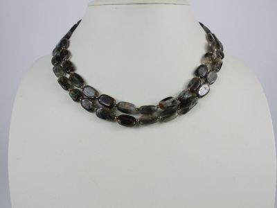a close up of a necklace on a mannequin mannequin mannequin mannequin mannequin mannequin mannequin mannequin