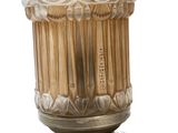 a vase that has a lot of toothpicks in it