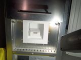 a microwave that is sitting inside of a small oven
