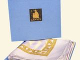 a close up of a blue box with two folded handkerchiefs in it