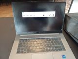 a laptop computer that is sitting on a table