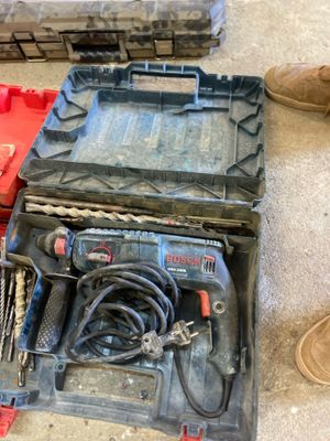 a tool box that has tools in it on the floor