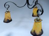 two lamps hanging from the ceiling in the room