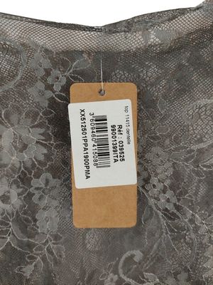 the back of a dress with a label on it