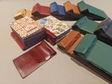 a lot of wallets that are sitting on a table