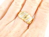 an image of a woman ' s hand with a ring on it