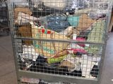 a metal cage with a bunch of items inside of it
