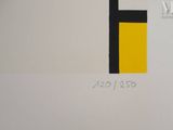 a picture of a yellow and black square on a white wall