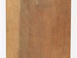 a close up of a piece of wood with a hole in it