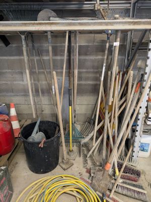 a lot of tools that are sitting on the floor