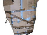 a cardboard box wrapped in duct tape on a white background