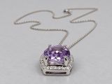 an amethorate and diamond pendant on a chain