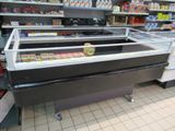 a refrigerated display case in a grocery store