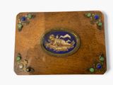 a plaque with a picture of a cat and a dog on it