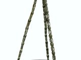 a bird feeder with eggs in it hanging from a chain