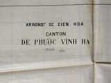 a sign on the side of a building that says cannon de phoc vinh ha
