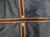 a piece of luggage that has two zippers on it