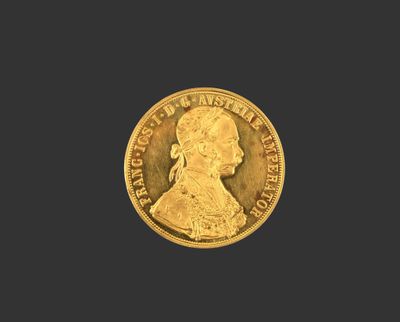une pièce d'or portant le portrait d'un homme