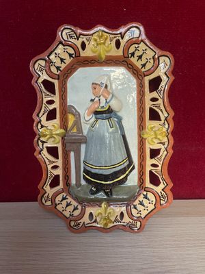 a picture of a picture of a woman in a blue dress
