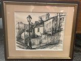 dessin représentant un lampadaire dans un cadre posé sur une table