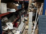 a room filled with lots of boxes and shelves