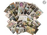 a pile of old postcards on a white surface