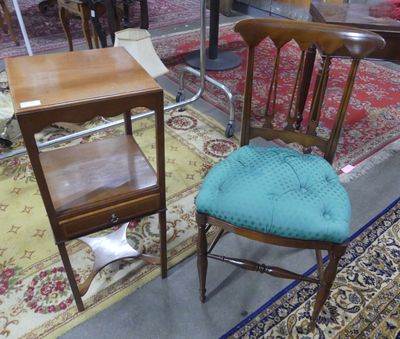 two chairs and a table in a room with rugs