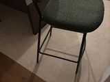 a chair that is sitting in the corner of a room
