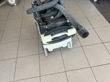 a machine that is sitting on the floor in a room