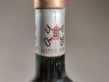a bottle of wine that is sitting on a table